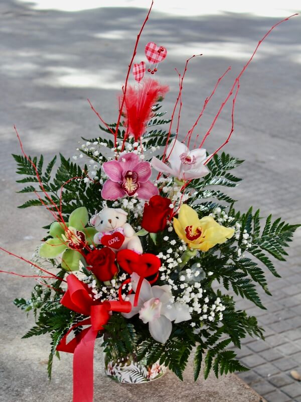 centro de orquideas y rosas rojas para regalar en Torrent